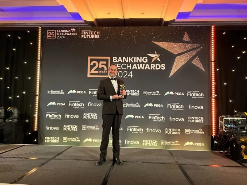 Plumery accepting the Banking Tech Awards 2024 trophy on stage